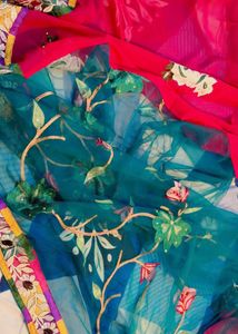 Vibrant magenta and green Floral Embroidered Saree