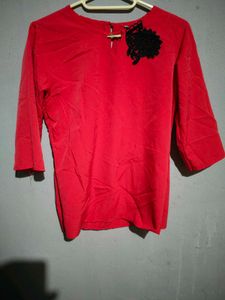 Elegant Red Top with Black Lace Accent