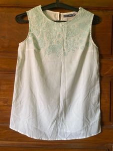 White Sleeveless Top with Paisley Print