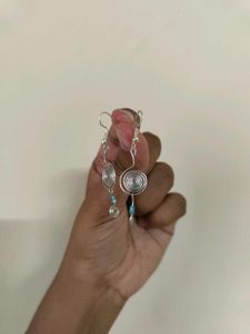 Silver Swirl Earrings with Blue Beads