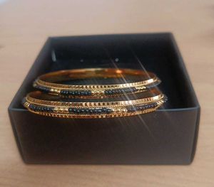 Avon Gold &amp; Black Beaded Bangles