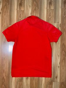 Tommy Hilfiger Men's orange Polo Shirt
