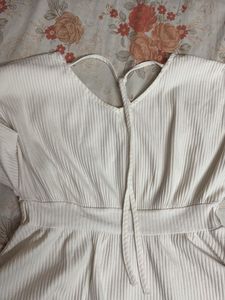 Cream Textured Peplum Top