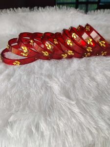 Elegant Red Bangles with Gold Embellishments
