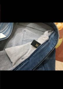 Blue Denim Jeans with Embellishments