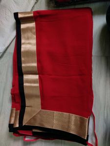 Vibrant Red Saree with Gold Border