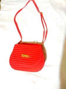 Red Stylish Striped Sling Bag....👛