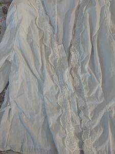 Elegant White Lace Trimmed Peplum Top