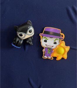 DC Kinder Joy Catwoman and joker pop it