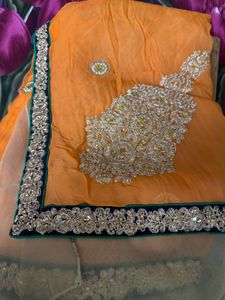 Elegant Orange & Gold Embellished Saree