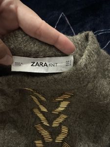 Zara sweater with gold-tone embellishments.