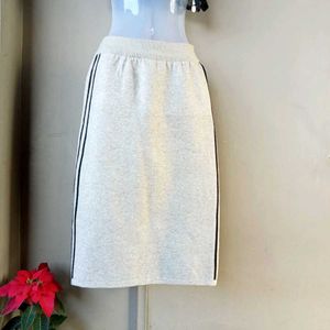 Chic Beige Skirt with Black Stripes