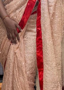 Stunning Sequined Saree with Red Border