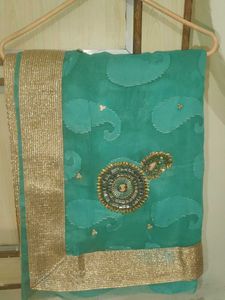 Elegant Teal Saree with Gold Border