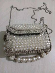 Elegant Pearl Embellished Clutch from Snatcher