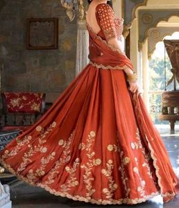 Elegant Orange Embroidered Lehenga Choli