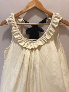 Chic Cream Ruffled Top with Bow Detail