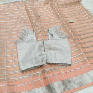 peach colour organza saree with designer blouse