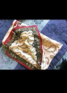 Elegant Cream Saree with Embroidered Border