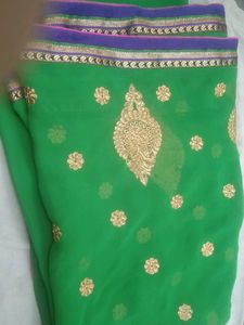 Vibrant Green Saree with Golden Embroidery