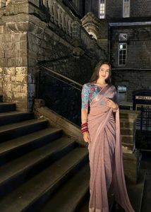 Elegant Pink Saree with Floral Blouse