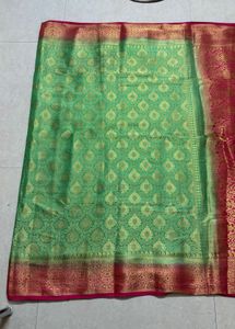 Green Silk Saree with Gold Border