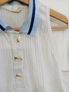 Chic Sleeveless White Polo Top