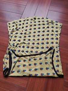 24) Patterned Sleeveless Reebok Top