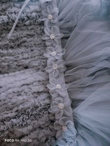 Blue Ruffled Gown