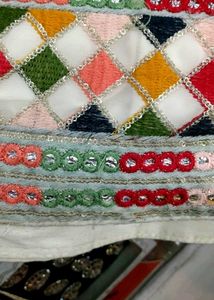 white multi pitch lehenga with f gift