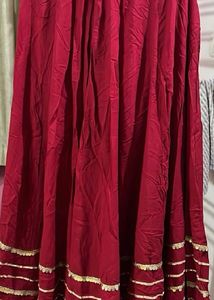 Red chaniya golden border & white blouse