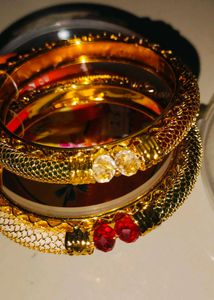 Brand new Elegant Gold Bangles with Red Stones