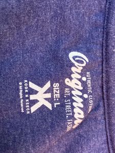 oversize tshirt with chains on the sides.