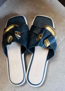 Stylish Black Slides with Gold Accent