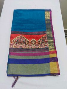Vibrant Teal Saree with Colorful Border