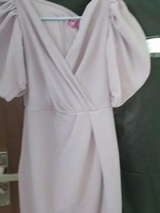 It Is Almost New . I Haven't Wore It Much. It's A Pretty Dress