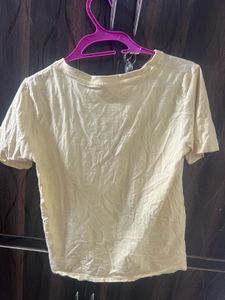 Cute Yellow T-Shirt with Flower Applique