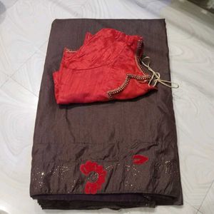 Elegant Brown Saree with Red Blouse