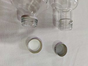 Set of Two Glass Bottles with Metal Caps