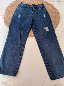 Distressed Blue Denim Jeans