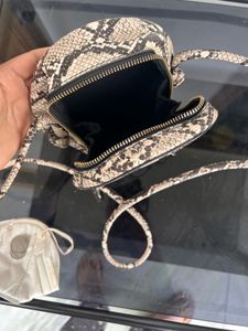 MANGO Round Snake Print Crossbody Bag