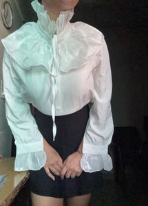 White pleated ruffle shirt