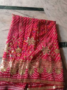 Stunning Bandhani Saree with Intricate Embellishme