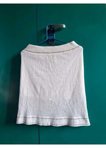 Elegant White Knit Top with Embellished Neckline