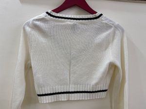 White Knit Sweater with Black Trim