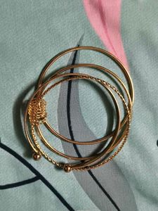 Elegant Gold Tone Bangle Set