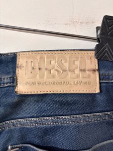 Distressed Blue Denim Jeans
