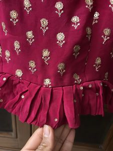 Embroidered Peplum Blouse