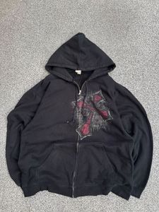 Black Zip-Up Hoodie with Cross Graphic