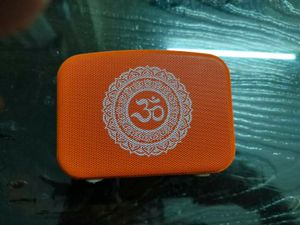 Orange Om Symbol Bluetooth Speaker